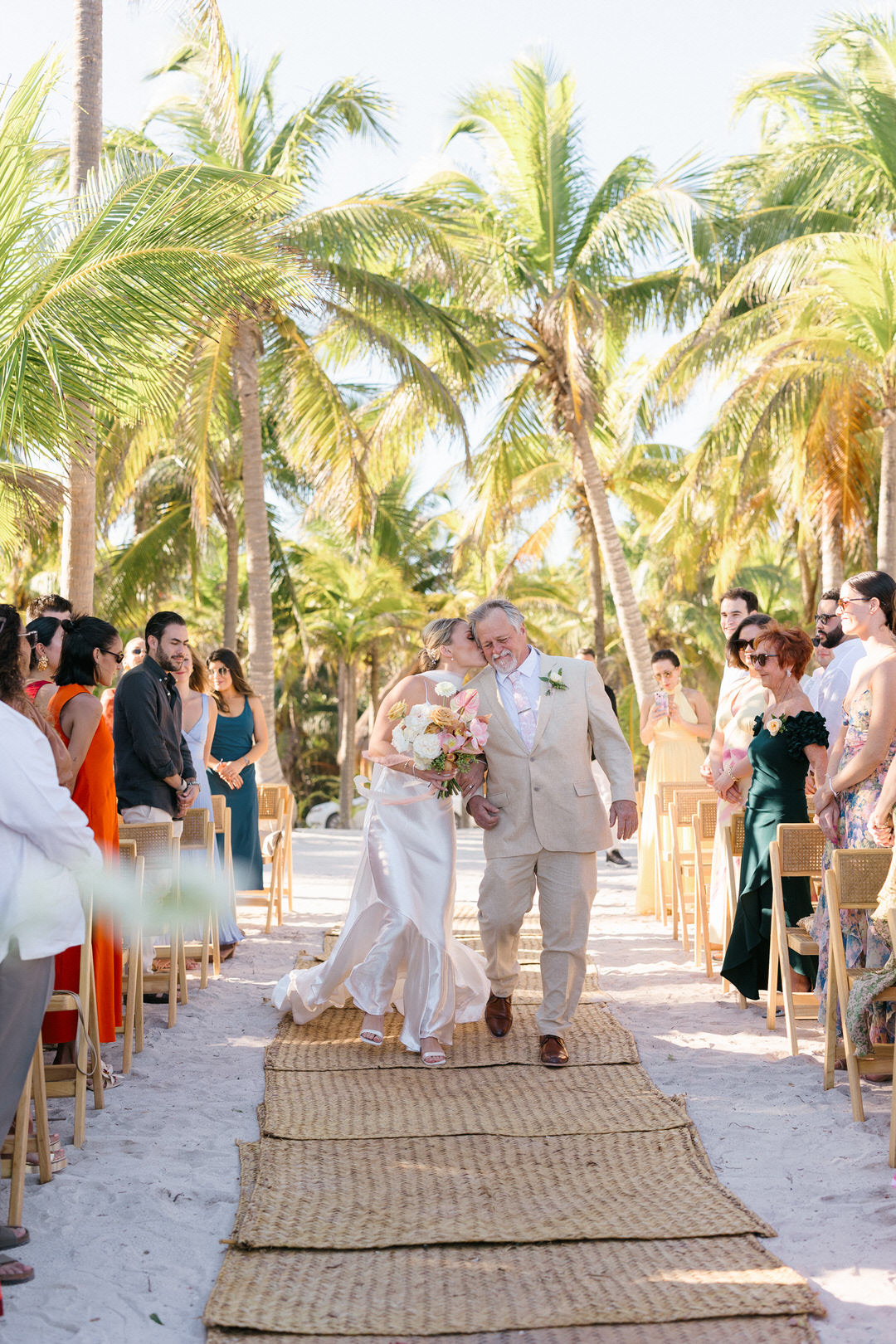 Elegant wedding ceremony in Tulum, Riviera Maya by Antonio Ojeda, destination wedding photographer.