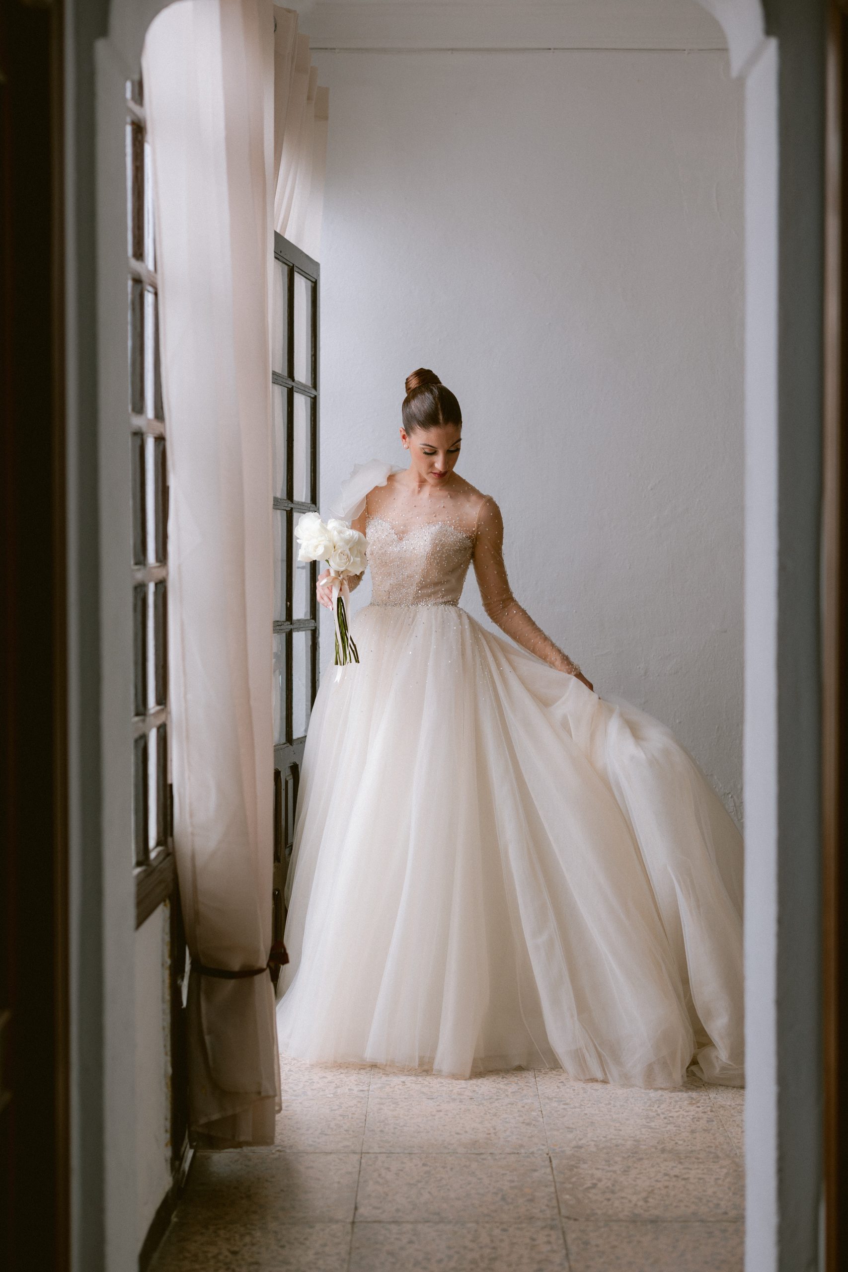 a bride with a Vera Wang dress