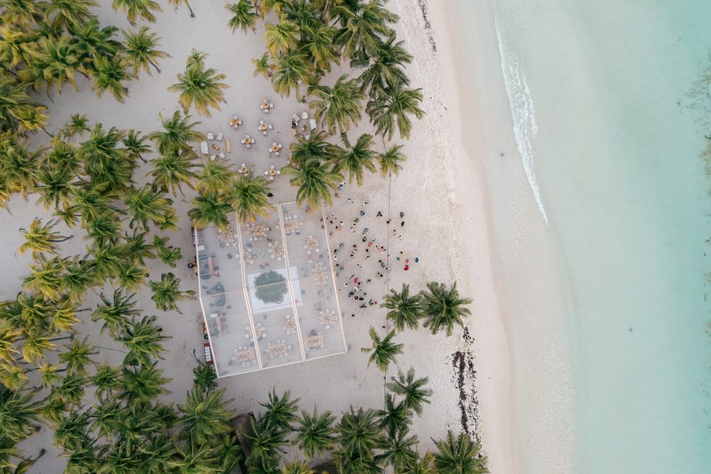 Groom and bride portrait at sunset Saasil Kantenah beach Riviera Maya