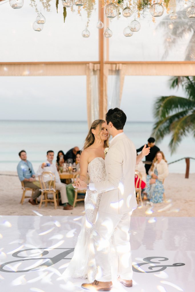 Flower arrangements and wedding decor on the beach at Saasil Kantenah