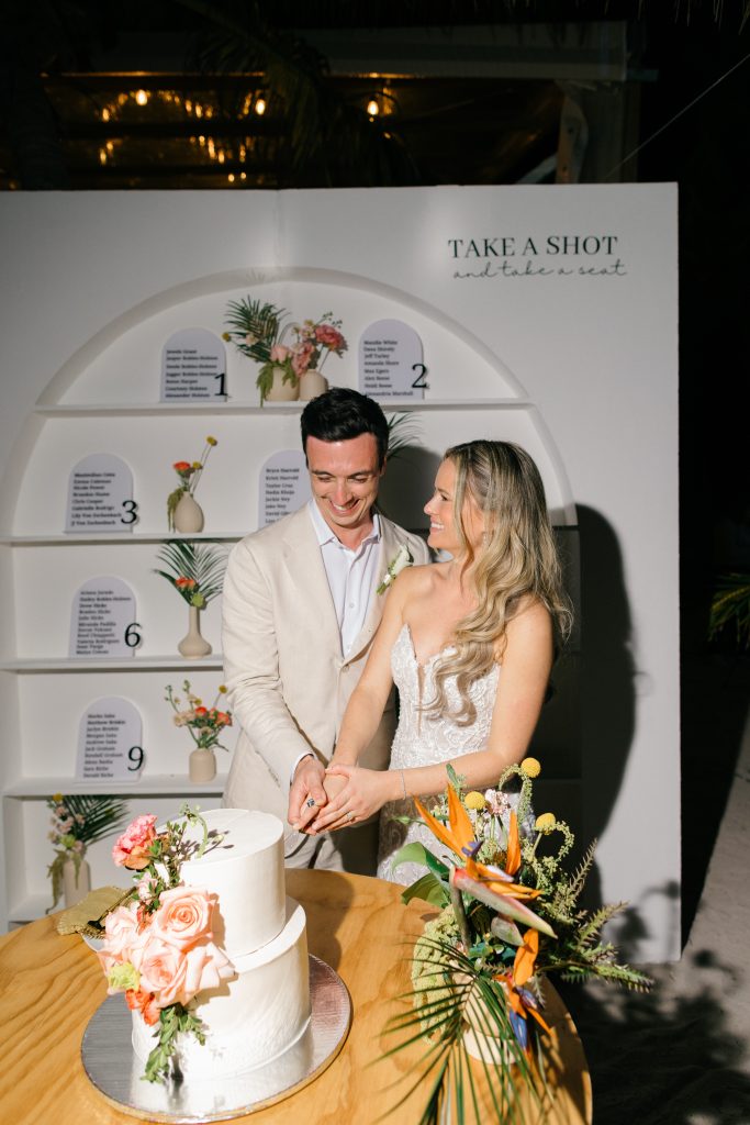 Couple exchanging vows at golden hour on Kantenah private beach Playa del Carmen