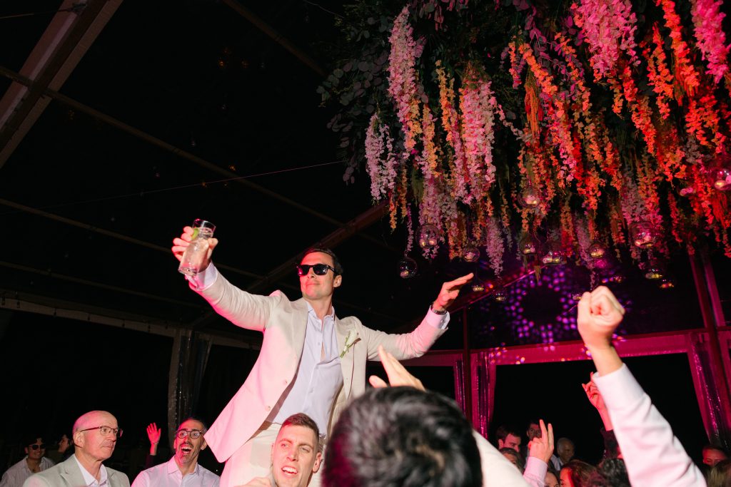 Groom emotional reaction as bride walks down the aisle at Kantenah beach wedding