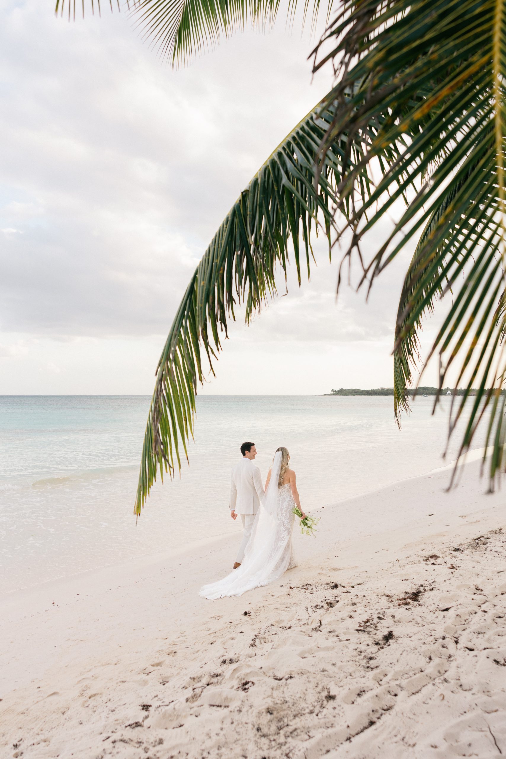 Romantic couple portraits on Kantenah beach at golden hour Playa del Carmen