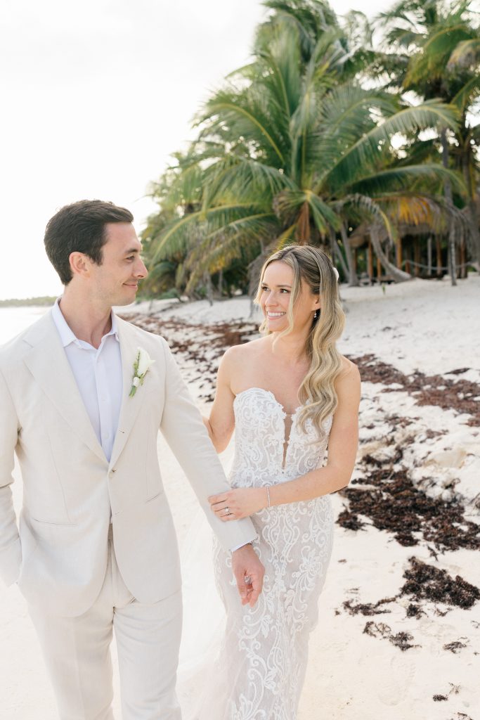 Bride and groom sunset photos Caribbean beach Riviera Maya wedding photographer