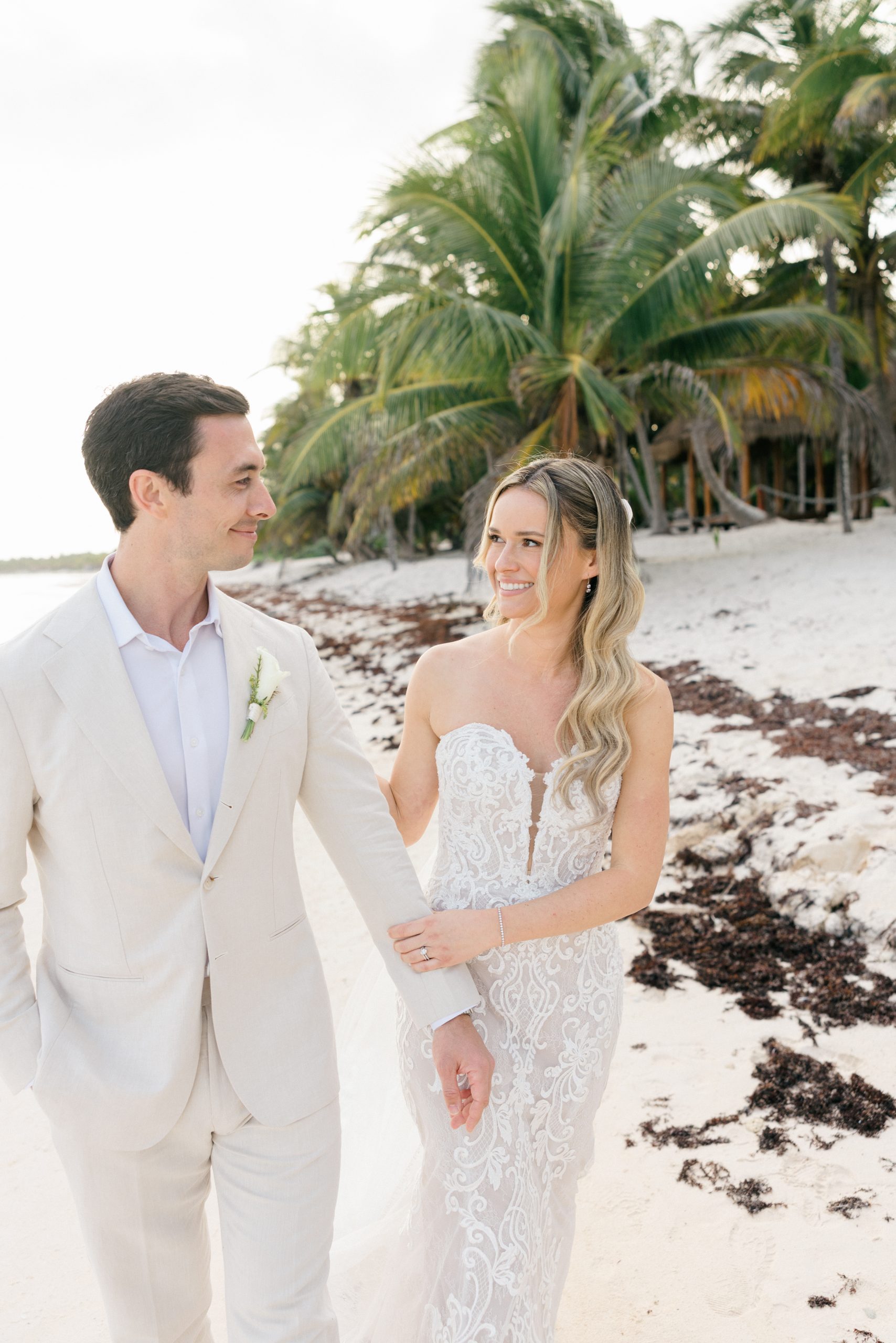 Bride and groom sunset photos Caribbean beach Riviera Maya wedding photographer