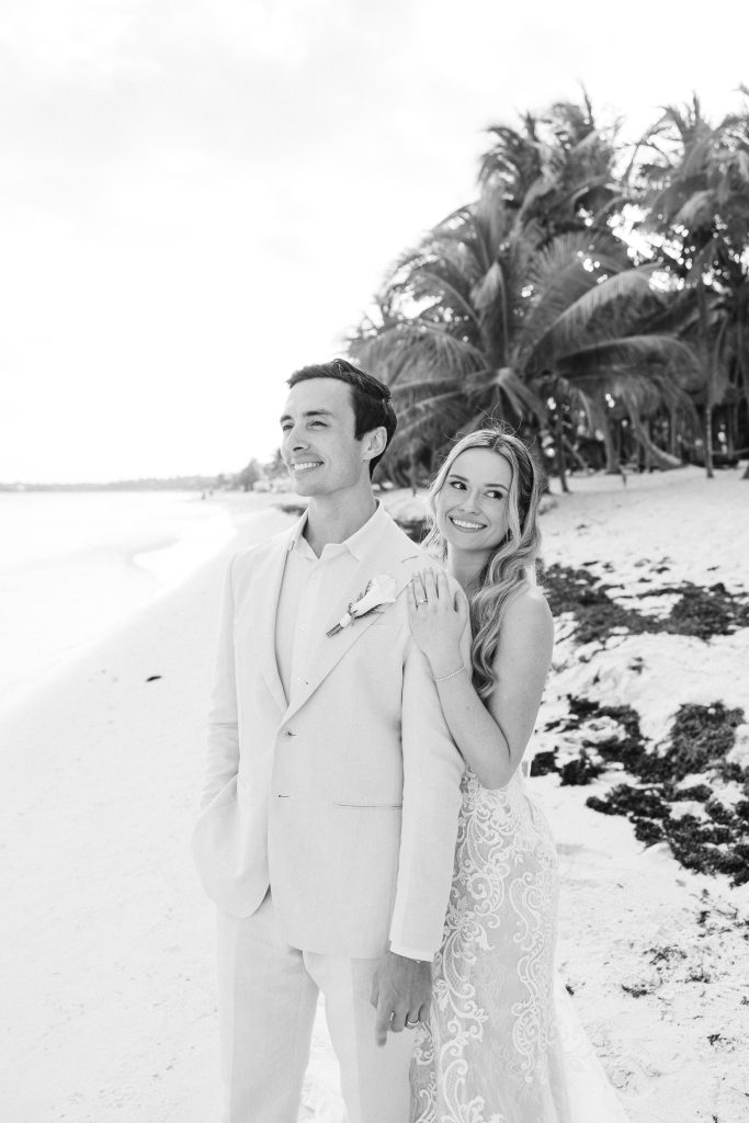 Bride and groom sunset photos Caribbean beach Riviera Maya wedding photographer