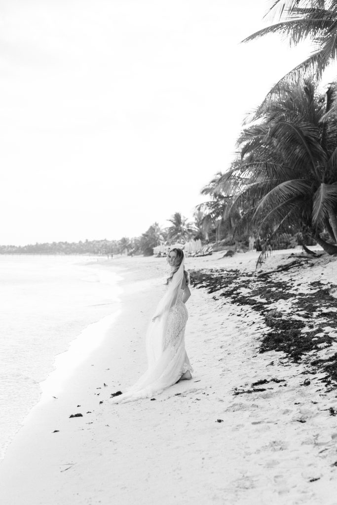 Wedding ceremony arch flowers Saasil Kantenah intimate beach wedding