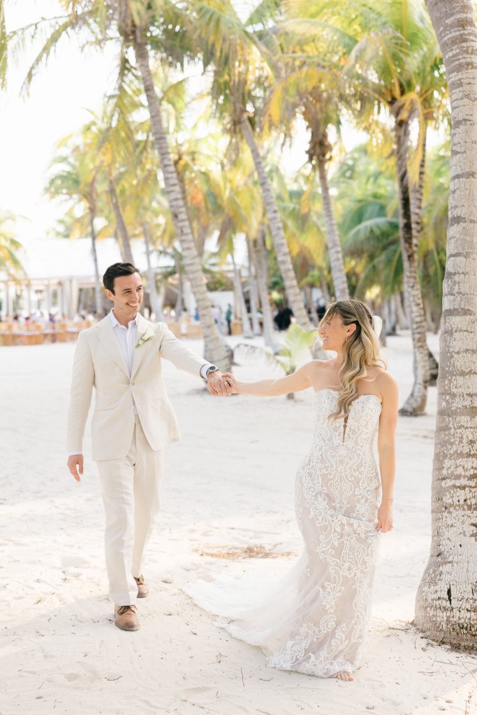 Drone aerial shot of wedding ceremony on Kantenah beach at golden hour