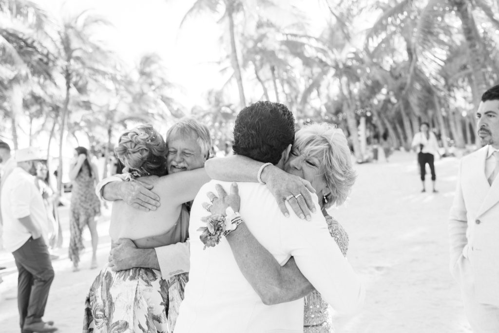 Destination wedding ceremony on Tulum’s beach at sunset, beautifully captured by a Tulum wedding photographer.