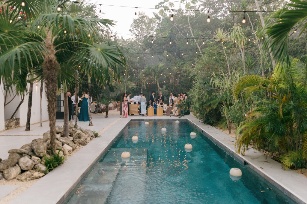 Wedding party group photo at Kima Tulum eco-sanctuary Tulum Mexico