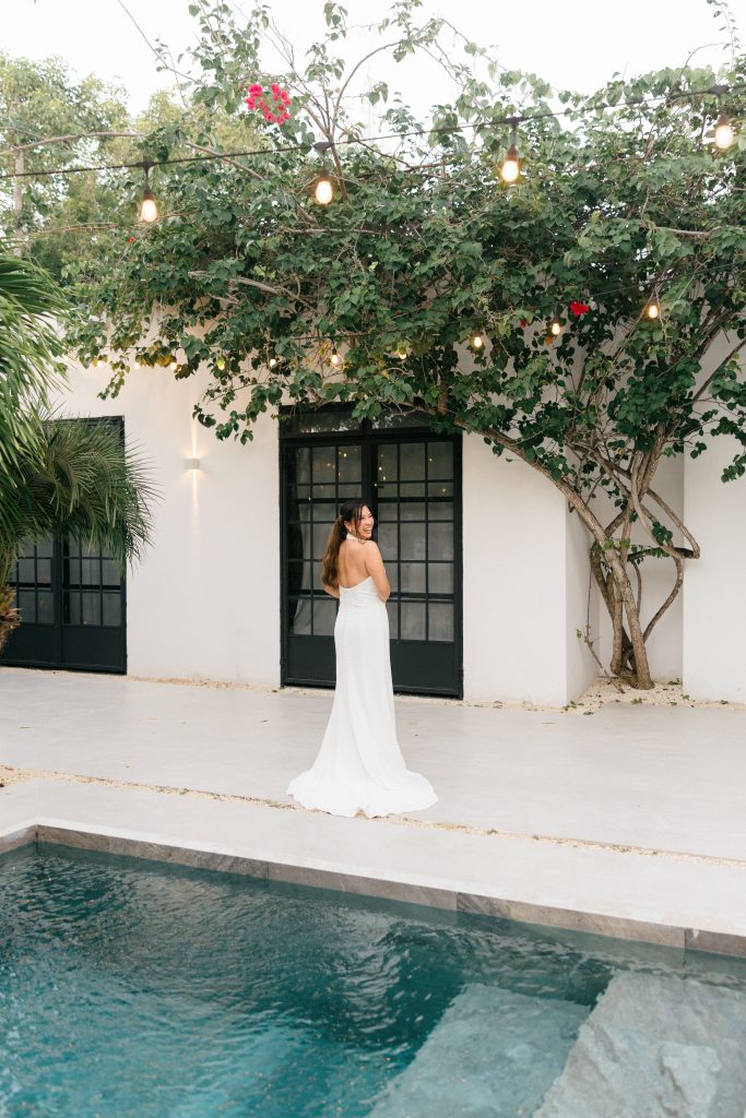 Detail of ceremony flowers at Kima Tulum, tropical floral arrangements
