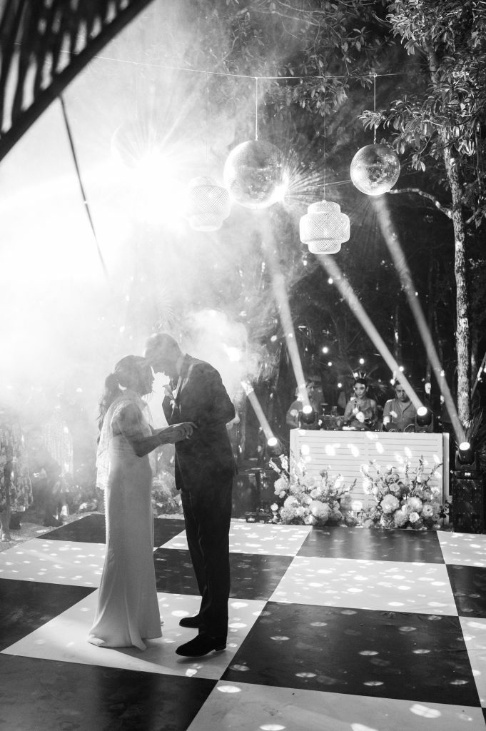 Details of wedding invitations and rings at Kima Tulum getting ready