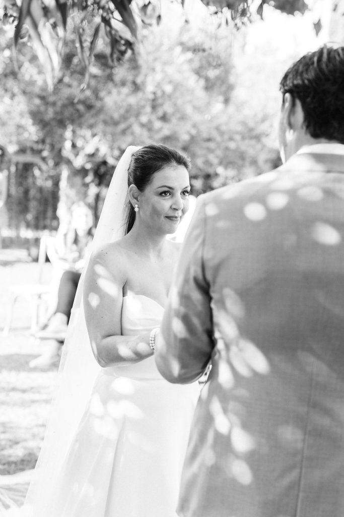 Bride and groom exchanging vows at Finca Monasterio