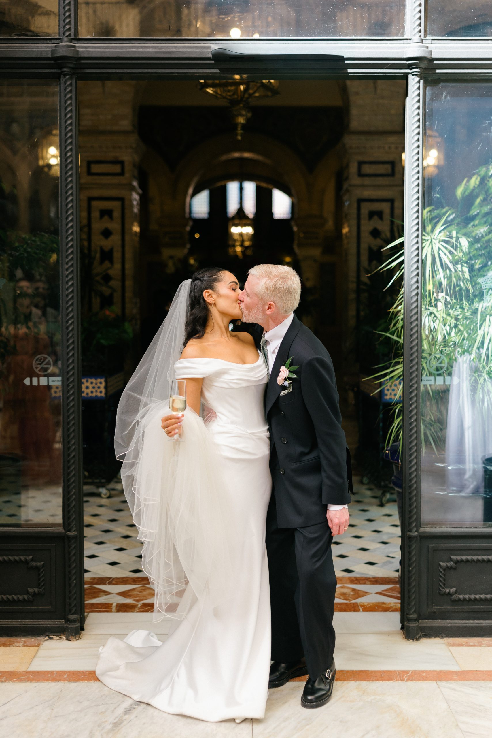 Wedding couple portrait at Hotel Alfonso XIII courtyard