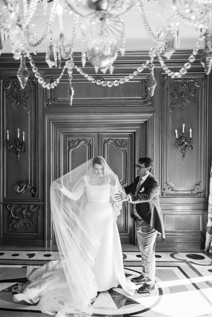 A bride getting ready with her father in a palace in Portugal.